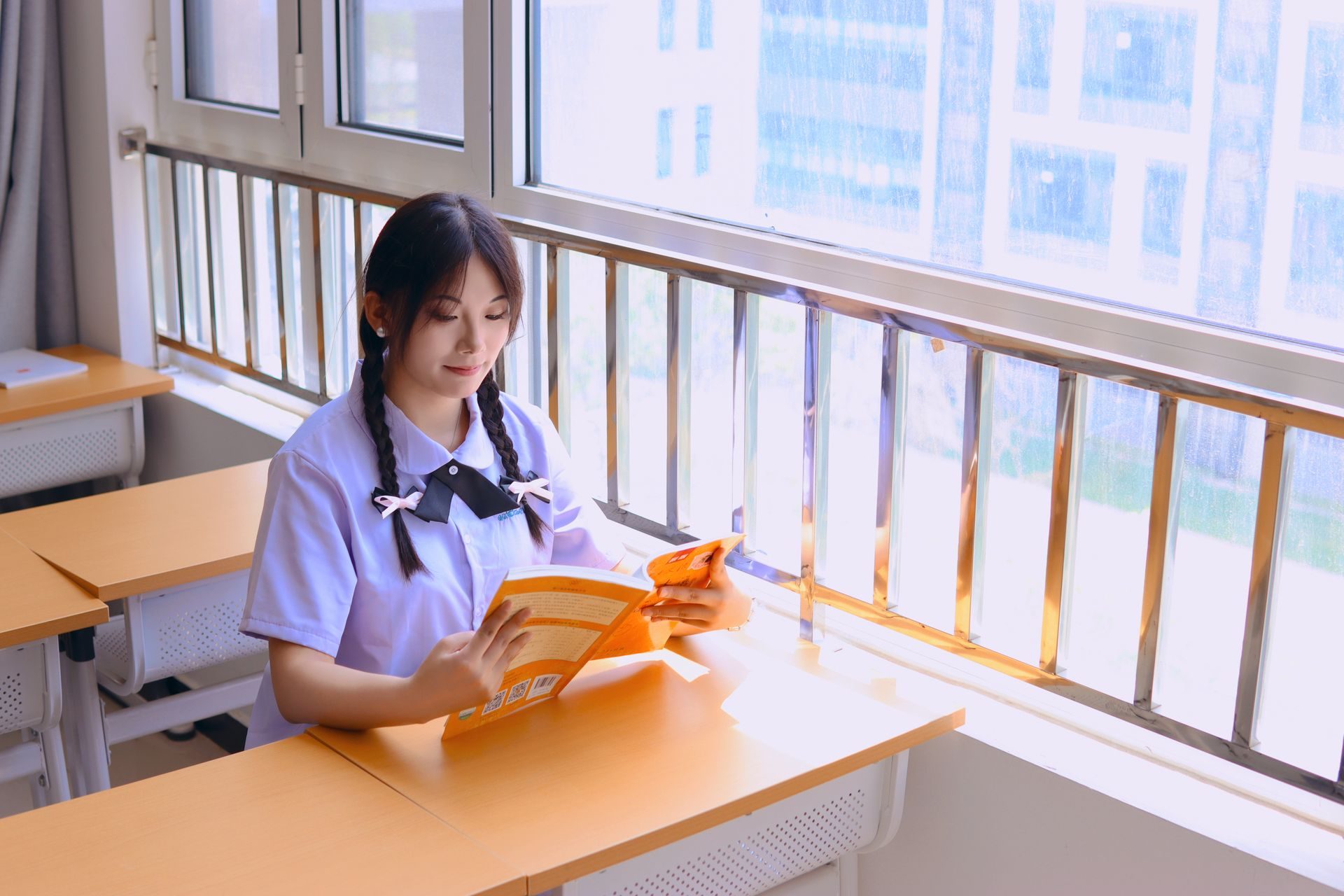 Pre-university students in a classroom during an A-Level lesson