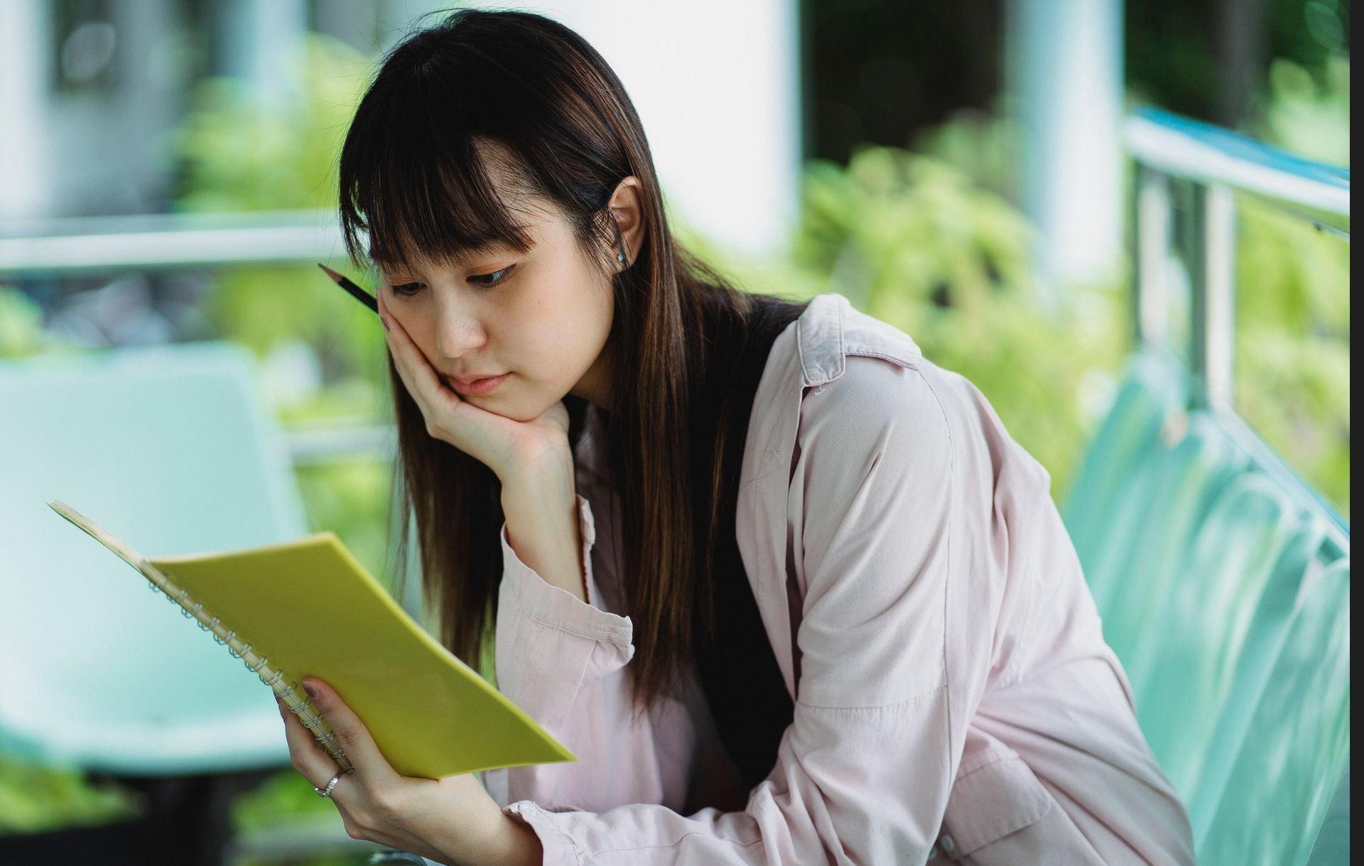 Student working quietly through revision during exam season